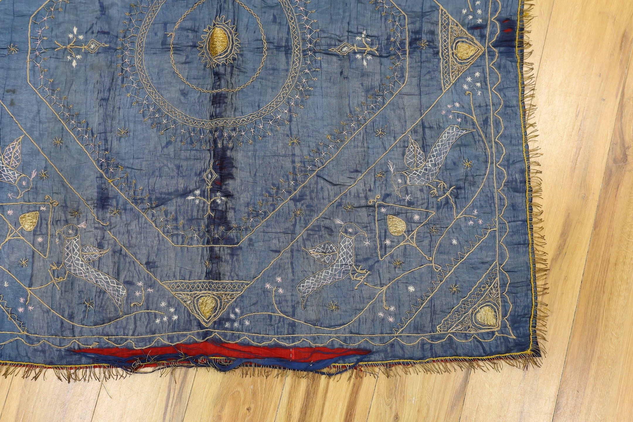 A late 19th century Indian silk and metal thread embroidered panel, approx: 118cms x118 cms